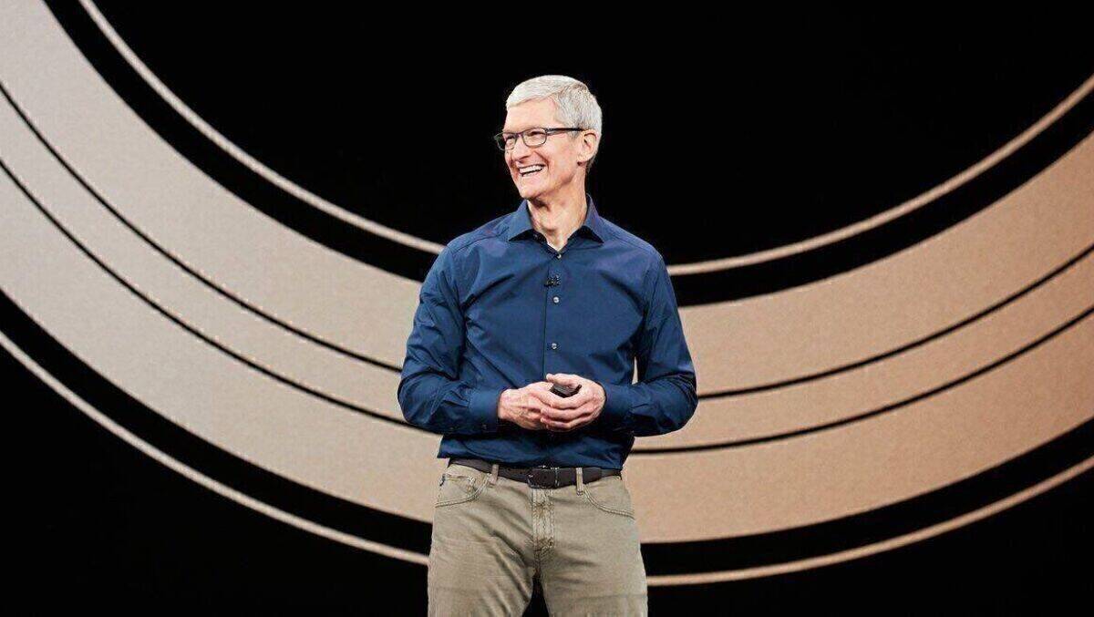 Kassenschlager iPhone: Da hat CEO Tim Cook immer gute Laune.