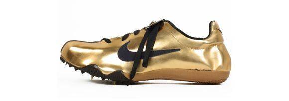green and gold track spikes
