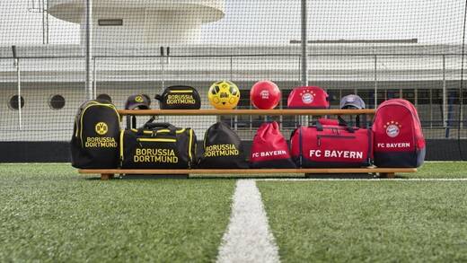 Fans von BVB und FCB kaufen künftig vermutlich öfters bei Deichmann ein.