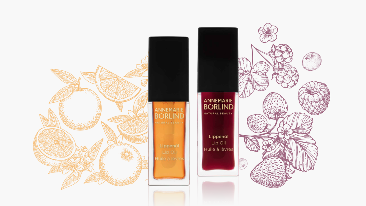 Produktbeispiel: Die veganen Lippenöle in den Farb- und Duftrichtungen "Orange Blossom" und "Wild Berry".