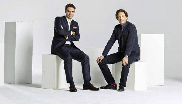 Group-One-CEO Marek Żołędziowski (l.) mit Serviceplan-Chef Florian Haller.