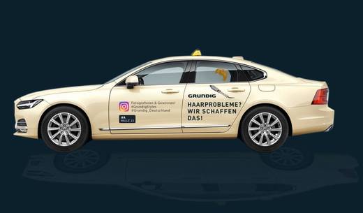 Angela-Merkel-Frisur auf dem Grundig-Taxi.