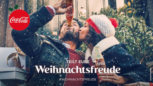 Ein Plakatmotiv von Coca-Cola, das zum Teilen auffordert.