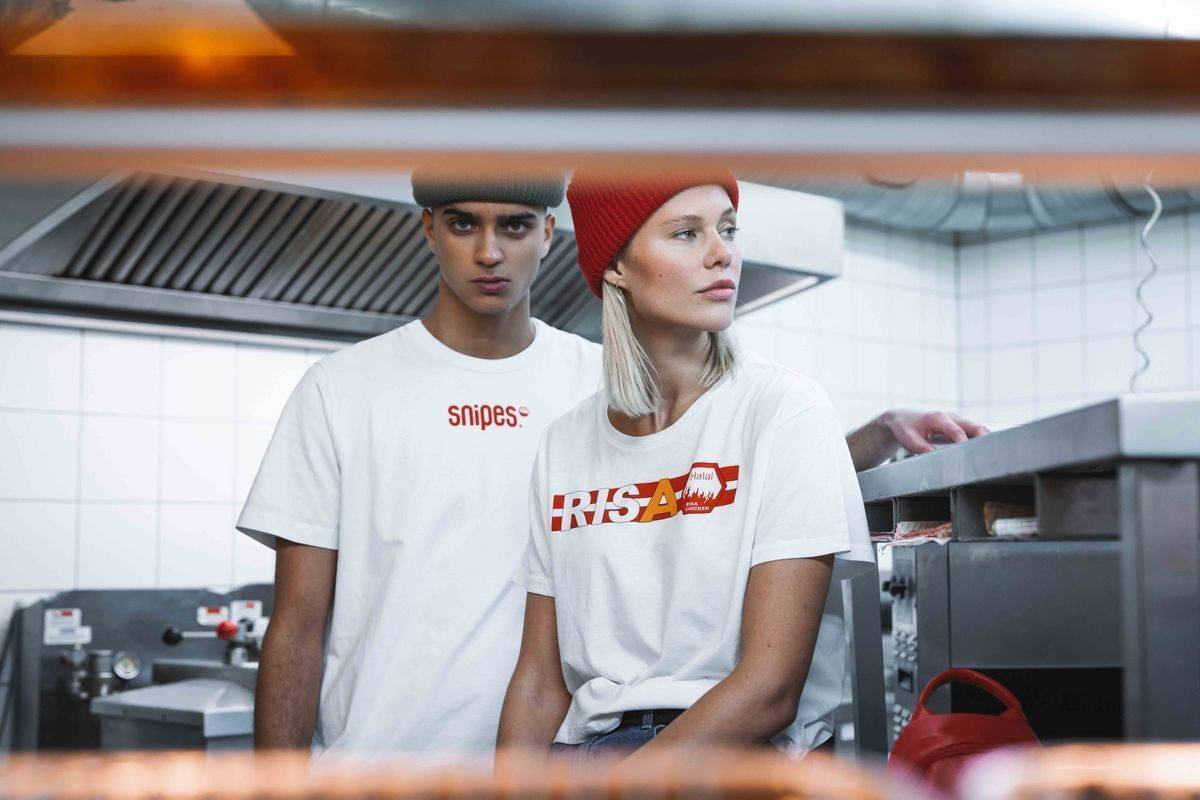 Ear to the street: Wer an „Kultfood“ aus Berlin denkt kommt an Risa Chicken nicht vorbei.Snipes hat deshalb eine Kooperation mit der Fastfood-Kette gestartet.
