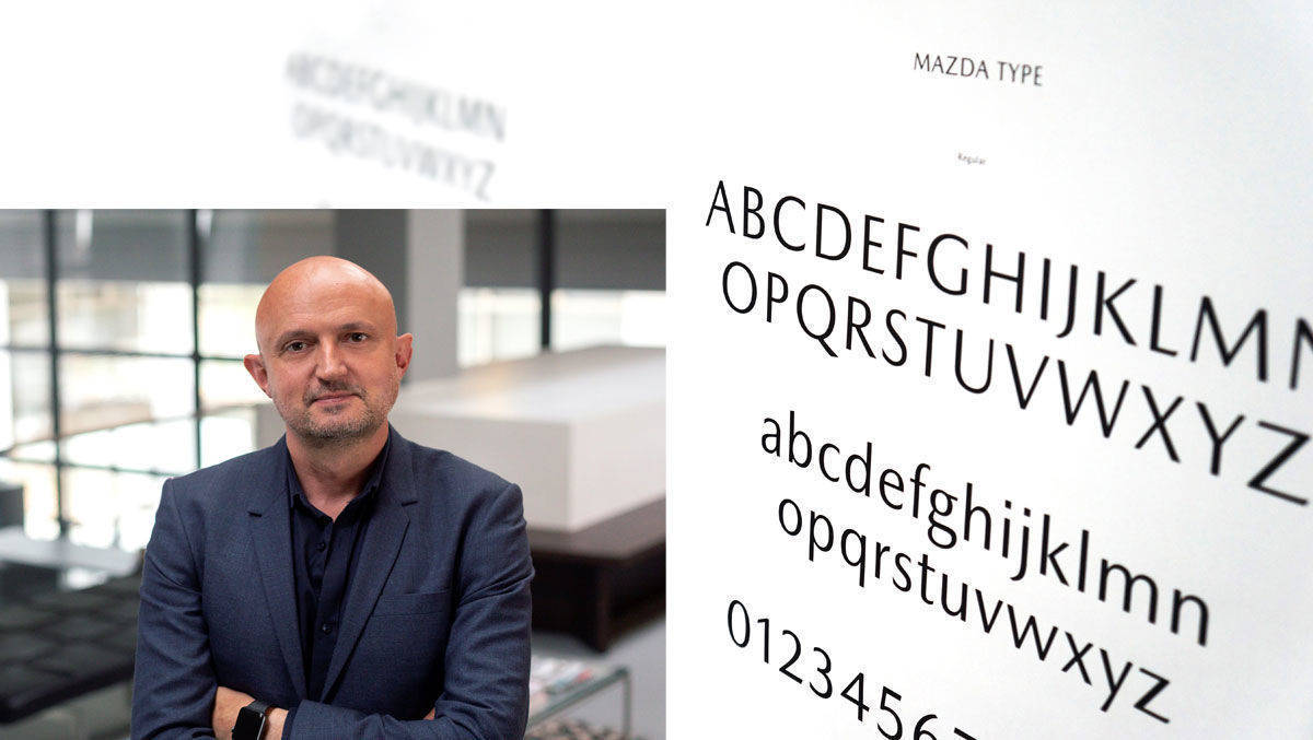 Jo Stenuit, Design Director Mazda Research & Design Centre, und die neue Mazda-Schrift.